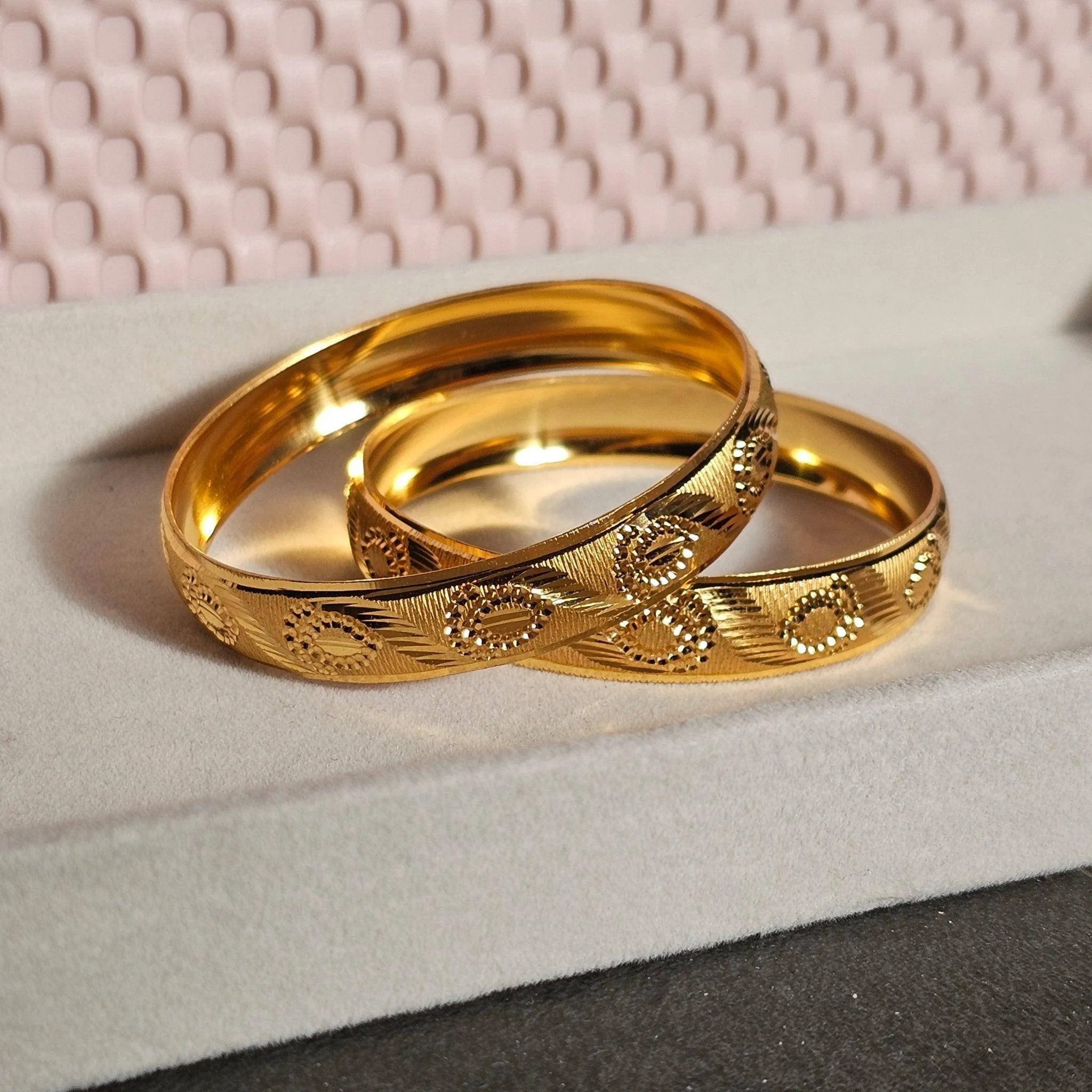 A Pair of Gold Plated Indian Bangles