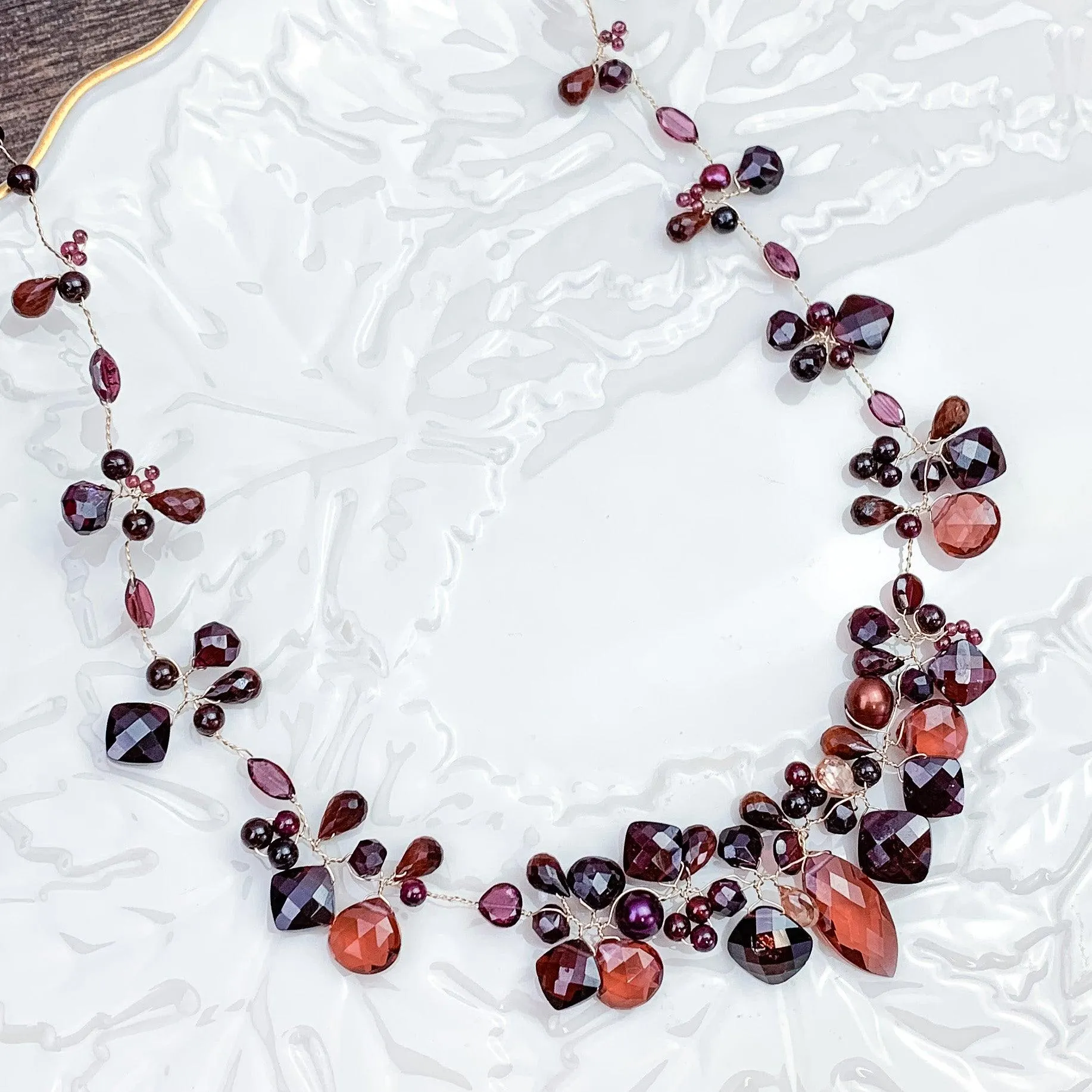 Enchanted Vine Garnet Necklace: A Symbol of Vitality and Elegance