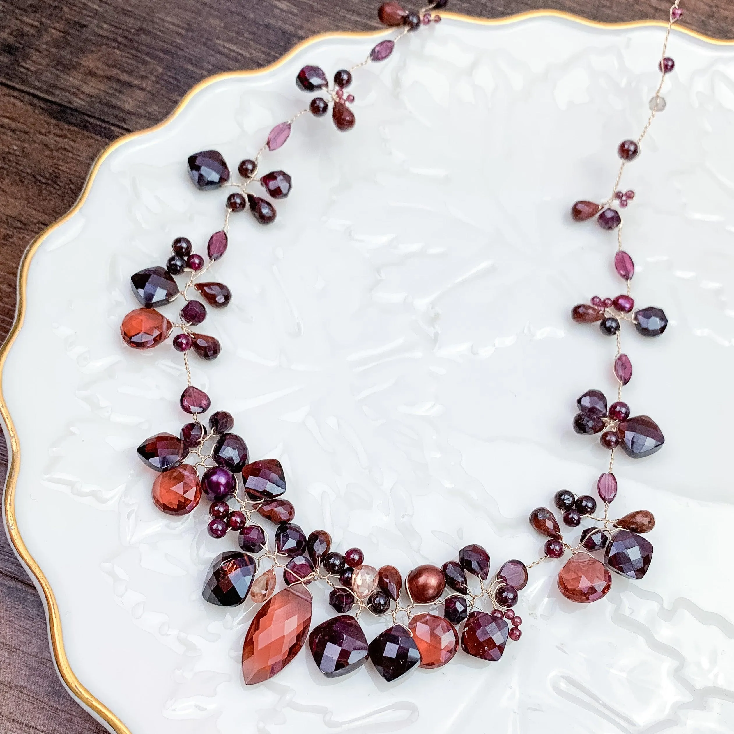 Enchanted Vine Garnet Necklace: A Symbol of Vitality and Elegance