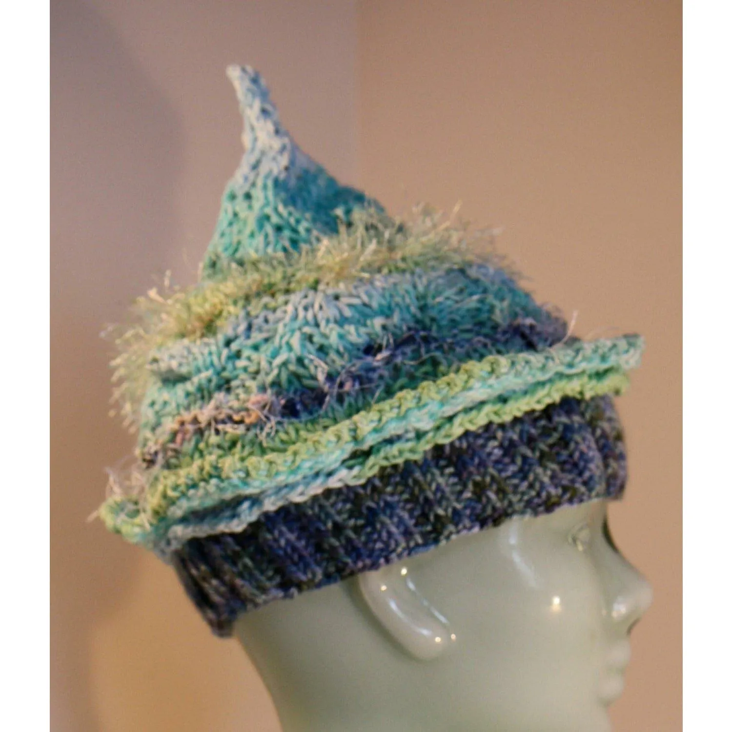 Hand knit pixie hat and scarf in Caribbean ocean blues and cottons.