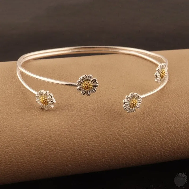 Handmade Sterling Silver Bangle with Four Daisies