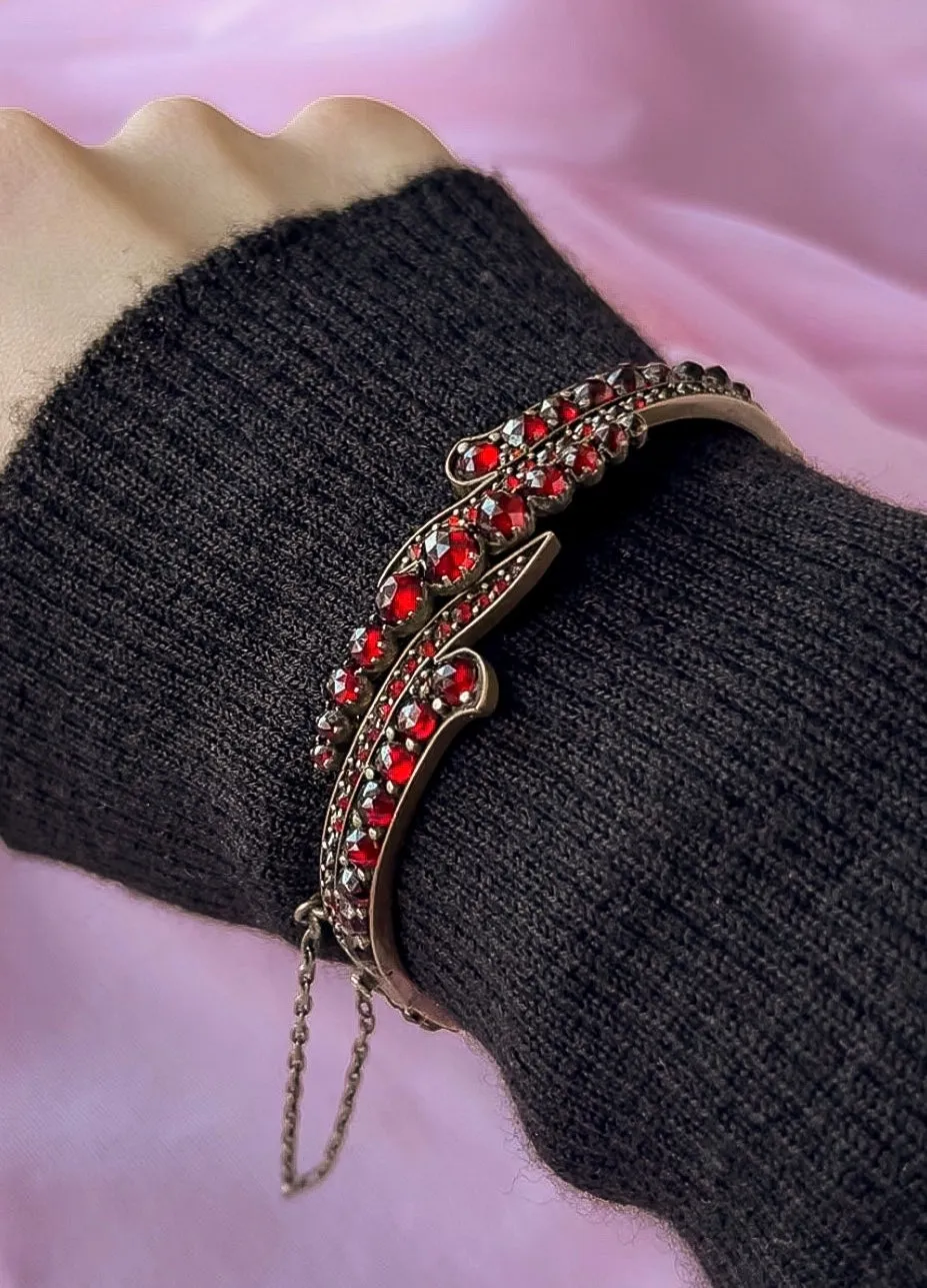 Outstanding Garnet Swirl Bangle Bracelet, circa 1890