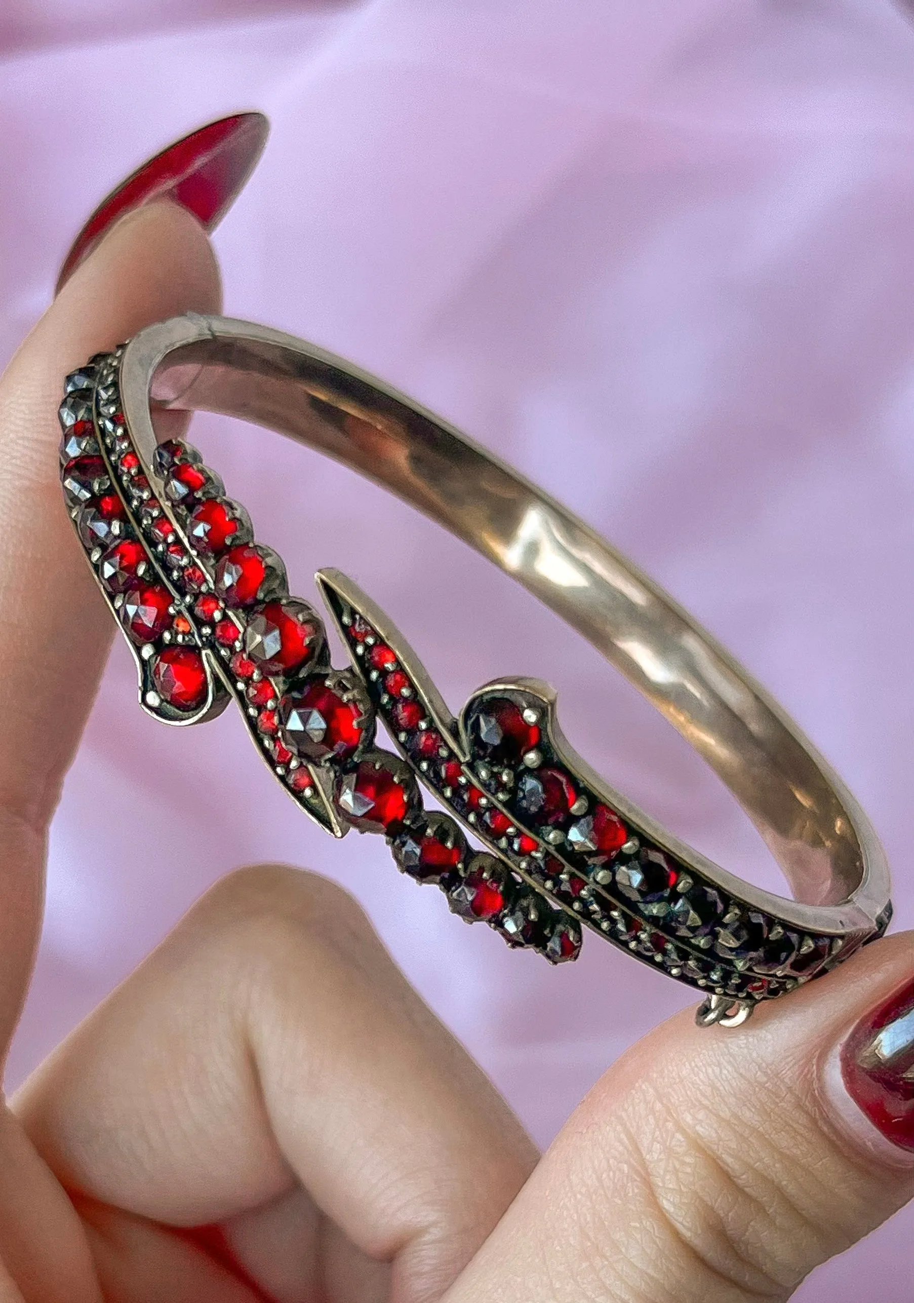 Outstanding Garnet Swirl Bangle Bracelet, circa 1890