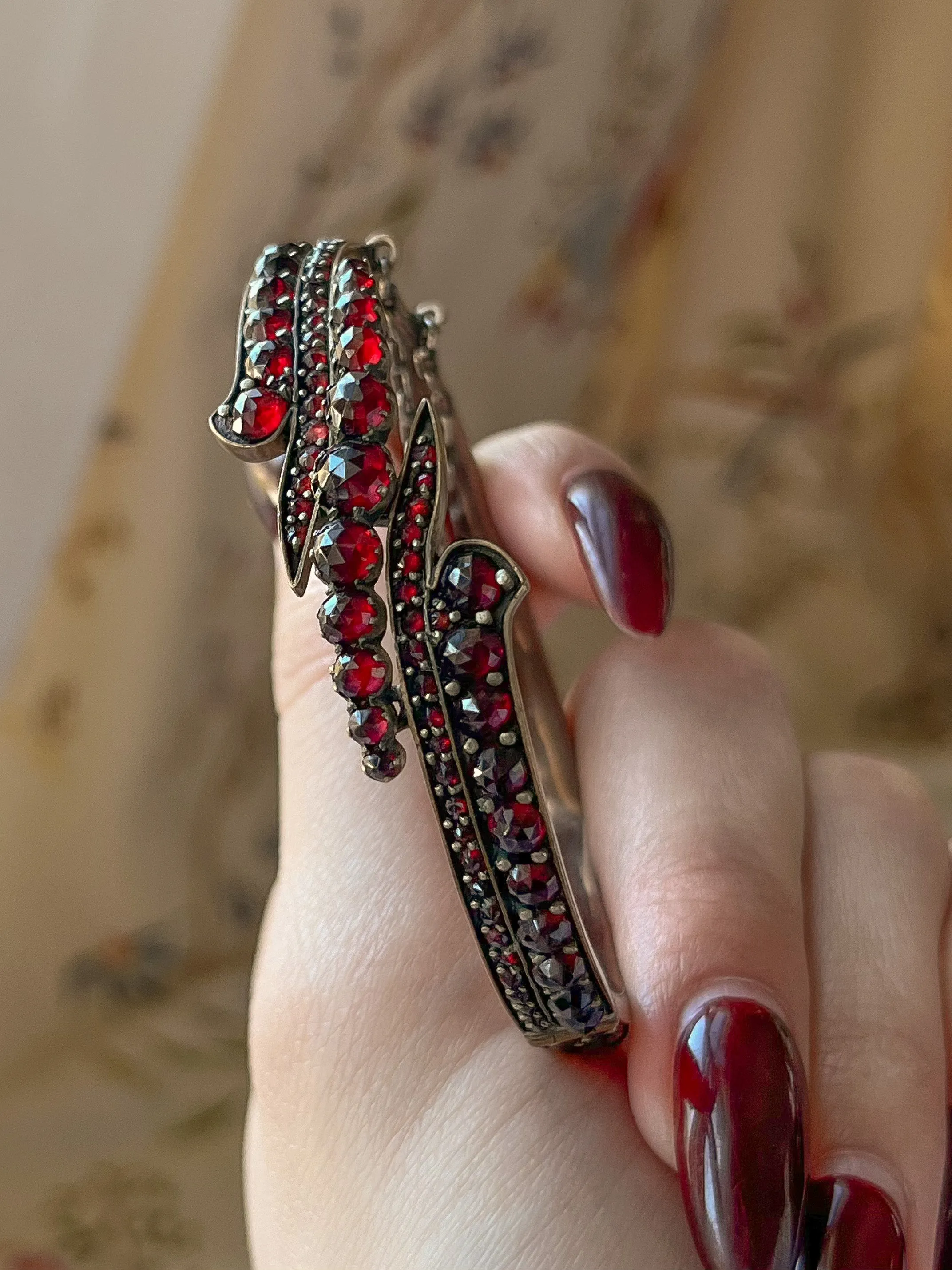 Outstanding Garnet Swirl Bangle Bracelet, circa 1890