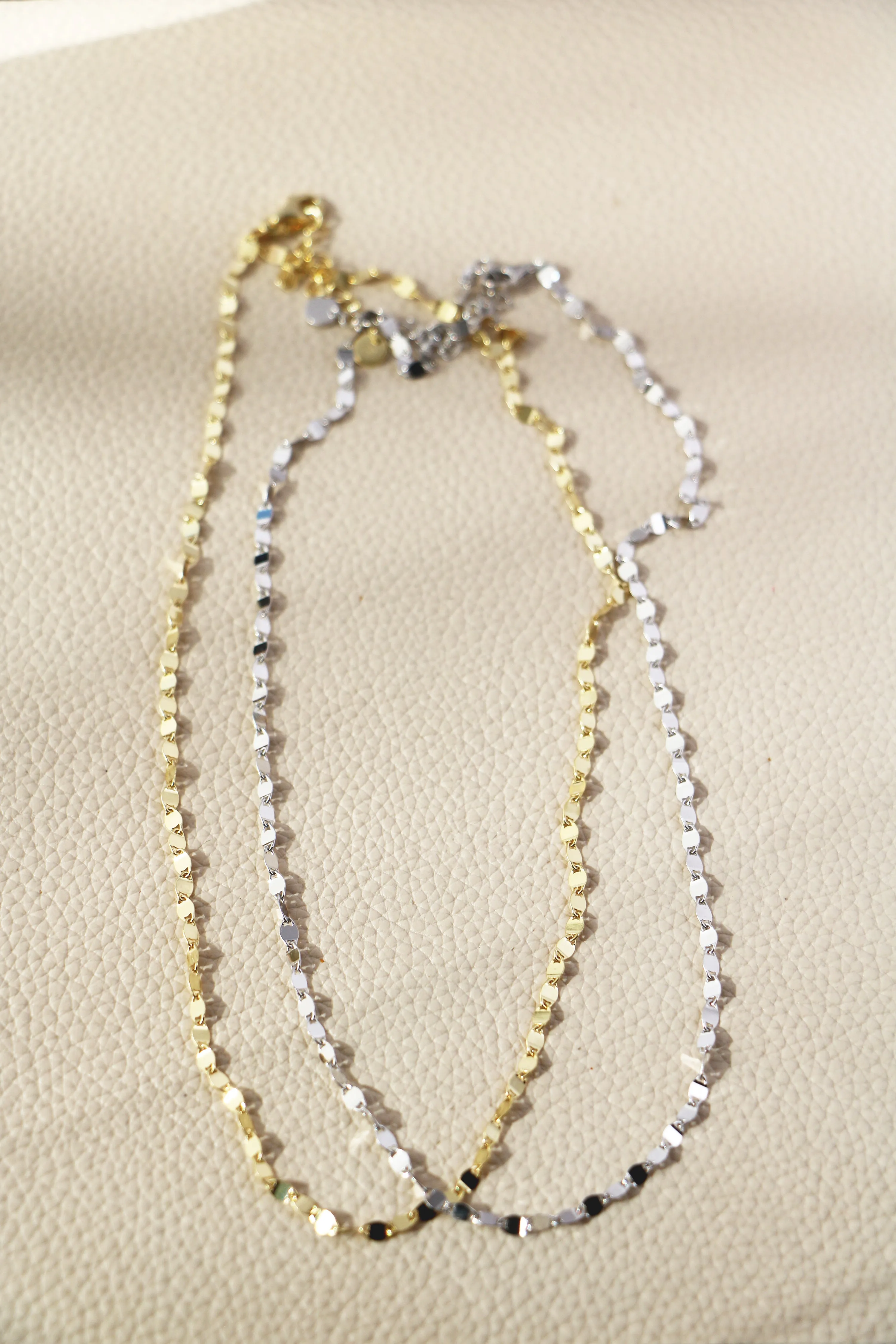 pebble layering chain { gold   silver }