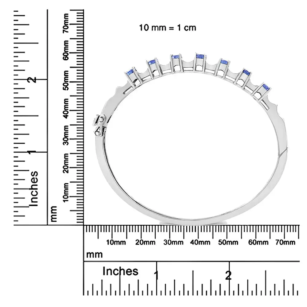 Radiant 14K White Gold Bangle Featuring 5MM Blue Tanzanite and Dazzling Diamond Highlights